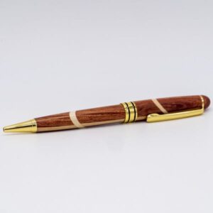 Stylo artisanal en bois tourné main motif circulaire foncé - Stylos Chics du Limousin - Haute-Vienne