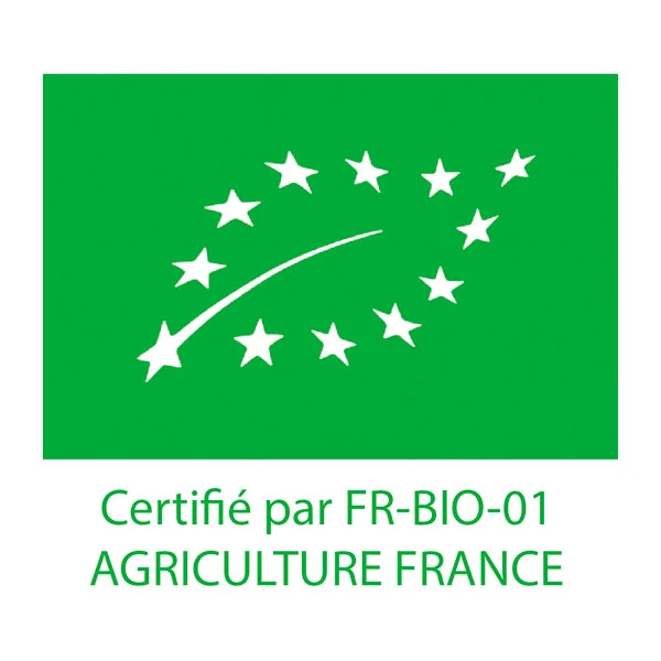 L'image représente le logo de la certification biologique européenne. Sur fond vert, douze étoiles blanches disposées en cercle encadrent une feuille blanche stylisée, composée également d'étoiles. En dessous du logo, le texte "Certifié par FR-BIO-01 AGRICULTURE FRANCE" confirme que le produit est conforme aux normes de l'agriculture biologique en France.